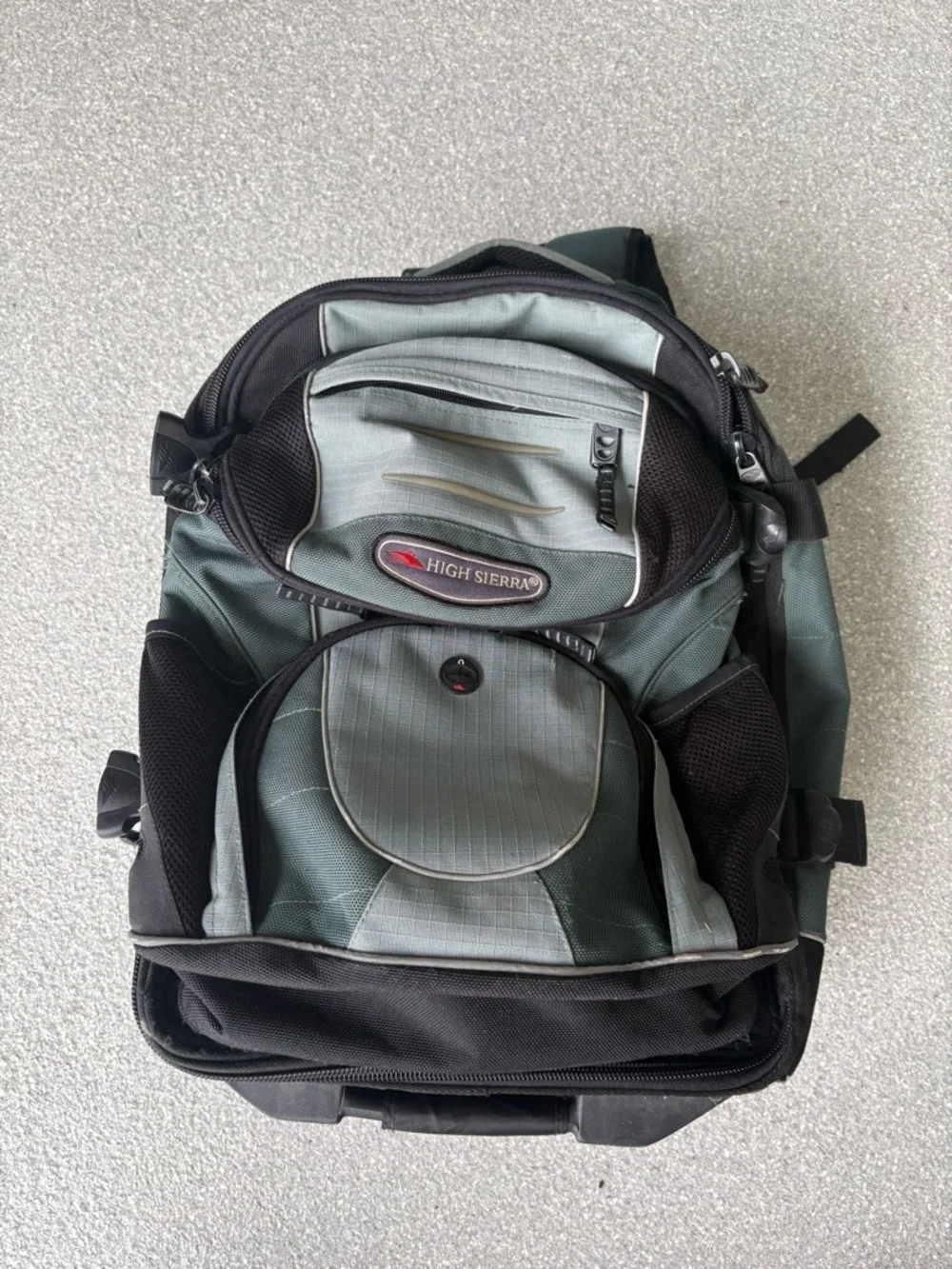 High Sierra Green Rolling Backpack/converts into carry on and regular backpack